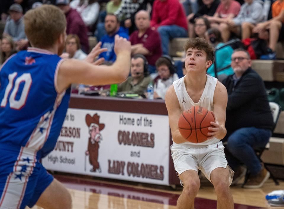 Henderson County’s Cooper Davenport (3) eyes a three-point shot as the Henderson County Colonels play the Apollo Eagles at Henderson County High School Friday night, Jan. 6, 2023.