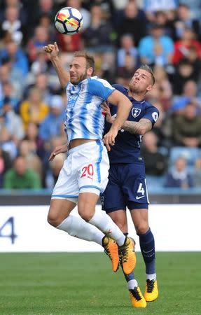 Soccer Football - Premier League - Huddersfield Town vs Tottenham Hotspur - John Smith's Stadium, Huddersfield, Britain - September 30, 2017 Huddersfield Town’s Laurent Depoitre in action with Tottenham's Toby Alderweireld REUTERS/Peter Powell