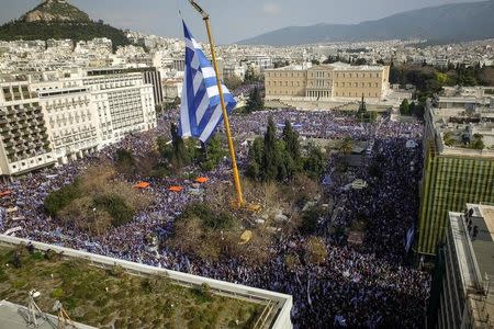 People take part in a rally against the use of the term "Macedonia" in any settlement to a dispute between Athens and Skopje over the former Yugoslav republic's name, in Athens, Greece, February 4, 2018. Eurokinissi/via REUTERS