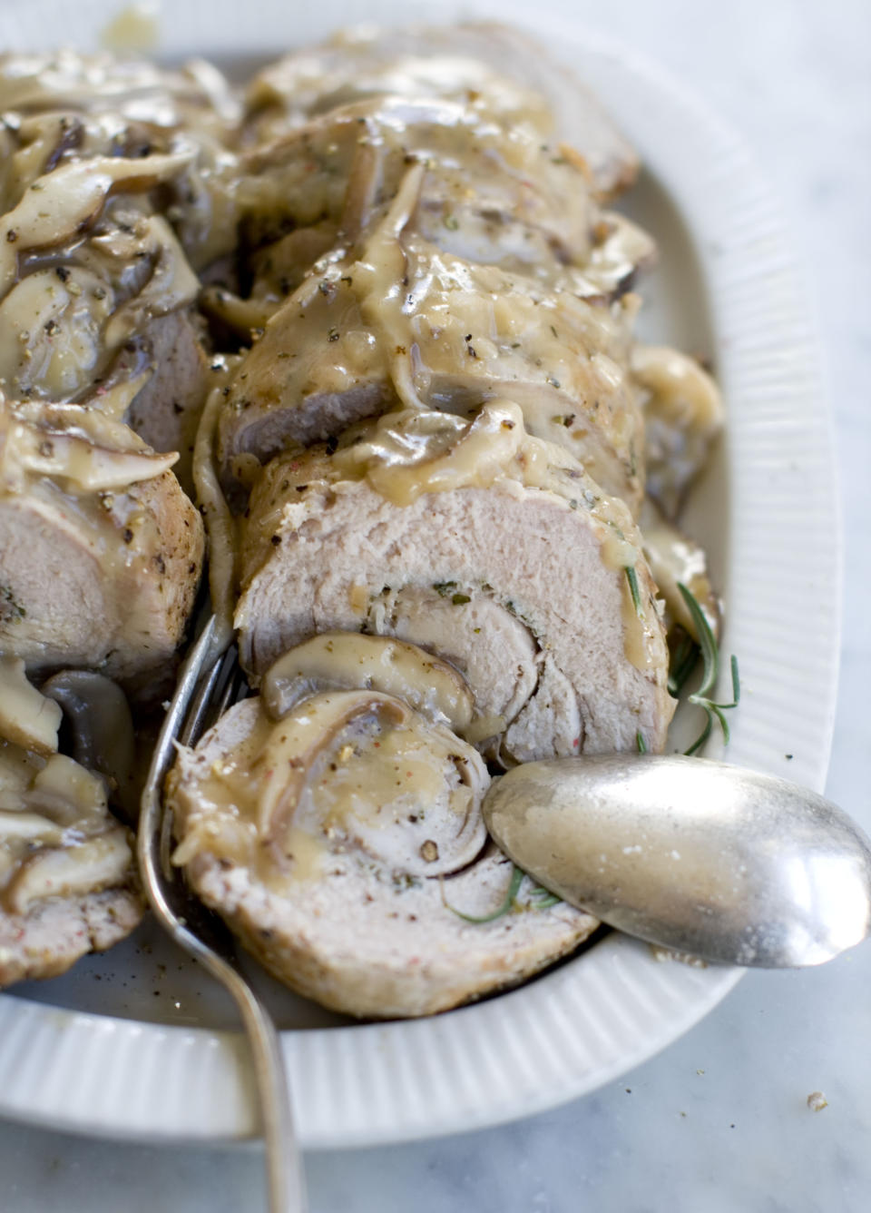 This Nov. 18, 2013 photo shows double pork roast with mushroom marsala sauce in Concord, N.H. (AP Photo/Matthew Mead)
