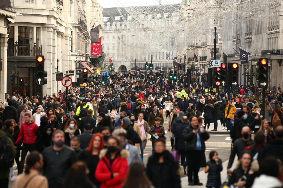 Shoppers fill a temporarily-pedestrianised Regent Street in London, England, on December 5, 2020. London has returned to so-called Tier 2 or 'high alert' coronavirus restrictions since the end of the four-week, England-wide lockdown last Wednesday, meaning a reopening of non-essential shops and hospitality businesses as the festive season gets underway. Rules under all three of England's tiers have been strengthened from before the November lockdown, however, with pubs and restaurants most severely impacted. In London's West End, meanwhile, Oxford Street and Regent Street were both packed with Christmas shoppers this afternoon, with the retail sector hoping for a strong end to one of its most difficult years. (Photo by David Cliff/NurPhoto via Getty Images)