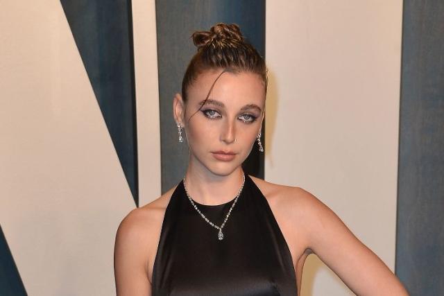 Sensation Emma Chamberlain Makes Her Way to Coachella in Black  Combat Boots and Gold Jumpsuit