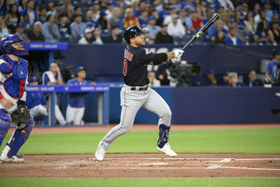 Cleveland Guardians' Ramon Laureano watches his two-run home run against the Toronto Blue Jays during the fourth inning of a baseball game Friday, Aug. 25, 2023, in Toronto. (Christopher Katsarov/The Canadian Press via AP)