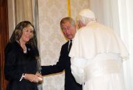 <p>With Pope Benedict XVI, 2009. On the duo's next visit in 2017, Prince Charles <a href="https://www.townandcountrymag.com/society/tradition/a9231109/prince-charles-pope-visit/" rel="nofollow noopener" target="_blank" data-ylk="slk:gave the Pope a thoughtful gift" class="link ">gave the Pope a thoughtful gift</a>.</p>