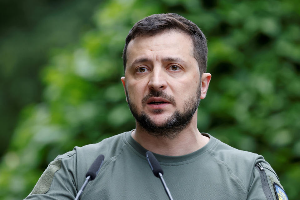 FILE - Ukraine President Volodymyr Zelenskyy attends a press conference in Kyiv, Thursday, June 16, 2022. On Friday, June 24, The Associated Press reported on stories circulating online incorrectly claiming a photo of Zelenskyy filming in front of a green screen shows he was “never in his own land.” (Ludovic Marin, Pool via AP, File)