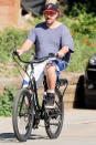 <p>Adam Sandler soaks up some sunshine while on a bike ride on Sunday in Malibu, California.</p>