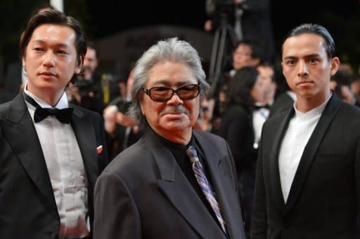 (L-R) Japanese actor Hideo Nakaizumi, director Koji Wakamatsu and actor Arata Iura arrive for the screening of "11.25 The Day He Chose His Own Fate" at the Cannes film festival in May. "Only commercial films are being supported by government funds in Asia so young filmmakers are only making commercial films," said Wakamatsu