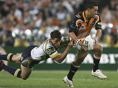 Wests Tigers’ Benji Marshall was at the height of his powers in the 2005 grand final, captured perfectly in a single play when he sprinted down the touchline before sneaking home the stealthiest of flick passes, behind his back, to Pat Richards. The Tigers were unstoppable with Marshall at the helm and beat the Cowboys 30-16.