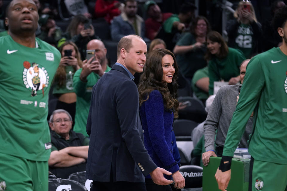 Britain's Prince William and Kate, Princess of Wales, arrive for an NBA basketball game between the Boston Celtics and the Miami Heat, Wednesday, Nov. 30, 2022, in Boston. (AP Photo/Charles Krupa)