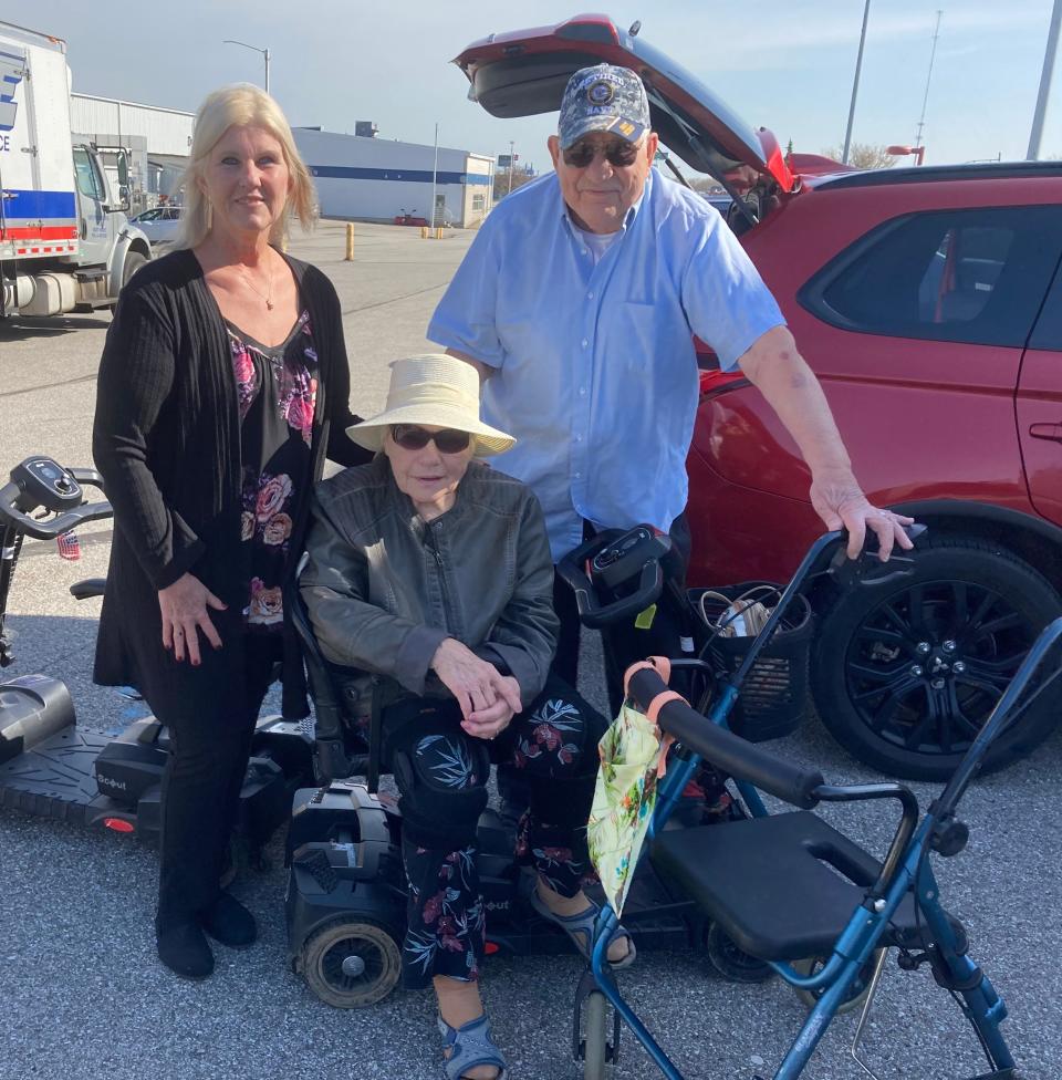 Colleen Callahan and parents Donna and Jim Welka, from left, are shown on April 21 at Erie Sports Center. A fundraiser was launched at the center that day to buy the couple a mobility van.