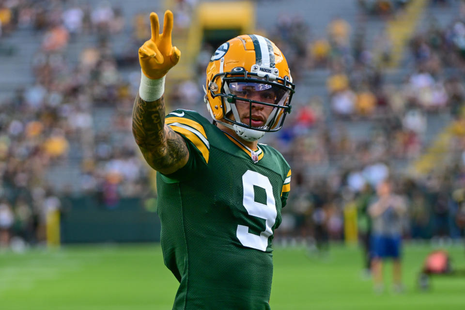 Aug 19, 2023; Green Bay, Wisconsin, USA; Green Bay Packers wide receiver Christian Watson (9) waves to fans before game against the <a class="link " href="https://sports.yahoo.com/nfl/teams/new-england/" data-i13n="sec:content-canvas;subsec:anchor_text;elm:context_link" data-ylk="slk:New England Patriots;sec:content-canvas;subsec:anchor_text;elm:context_link;itc:0">New England Patriots</a> at Lambeau Field. Mandatory Credit: Benny Sieu-USA TODAY Sports