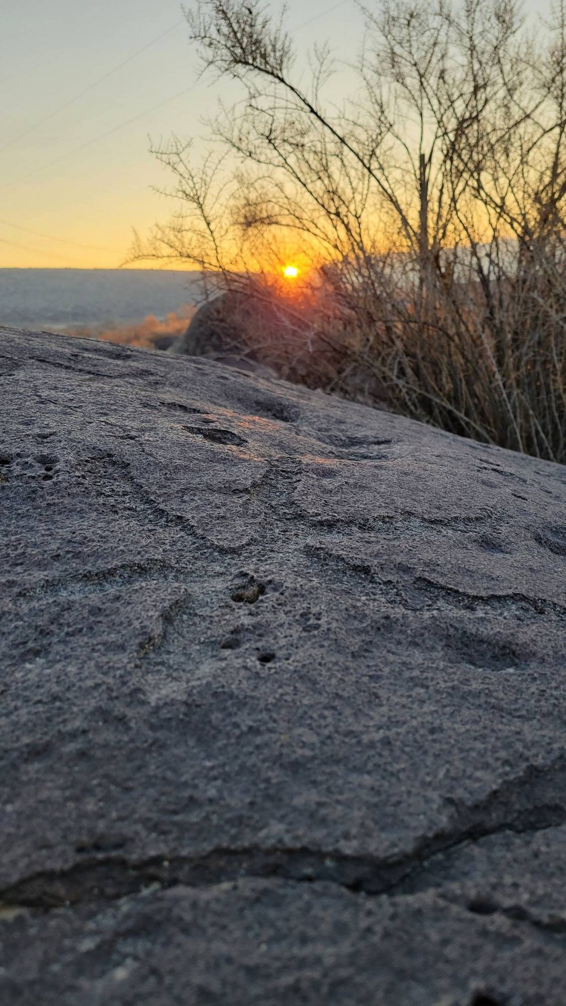 A petroglyph in Celebration Park that appears to be a star lines up with the sun during the Winter Equinox. This picture was taken on Dec. 21, 2021.