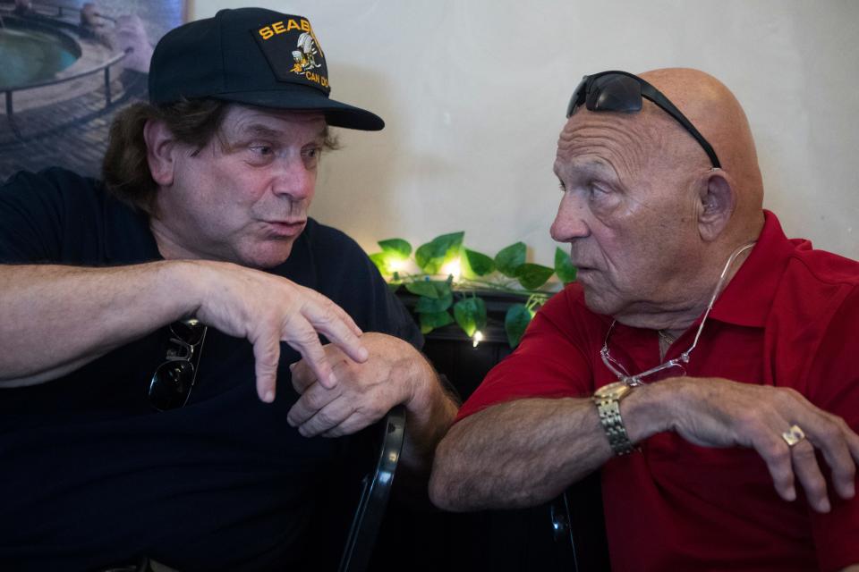 Longtime friends catch up during a gathering of former Little Italy residents Thursday, June 16, 2022, at Mrs. Robino's Restaurant.