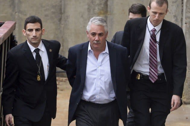 Former Suffolk County police chief James Burke in FBI custody in 2015 - Credit: Steve Pfost/Newsday RM/Getty Images