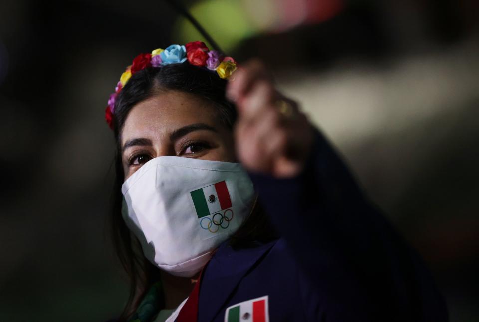Tokyo 2020 Olympics - The Tokyo 2020 Olympics Opening Ceremony - Olympic Stadium, Tokyo, Japan - July 23, 2021. An athlete from Mexico during the athletes' parade at the opening ceremony REUTERS/Hannah Mckay