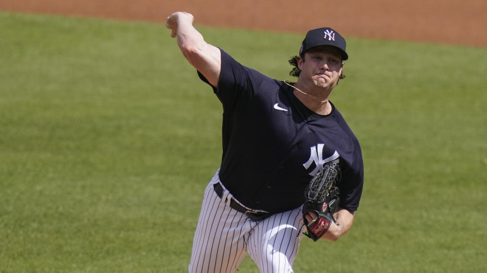 New York Yankees starting pitcher Gerrit Cole delivers a pitch during the first inning of a spring baseball game against the Detroit Tigers Monday, March 1, 2021, in Tampa, Fla. (AP Photo/Frank Franklin II)