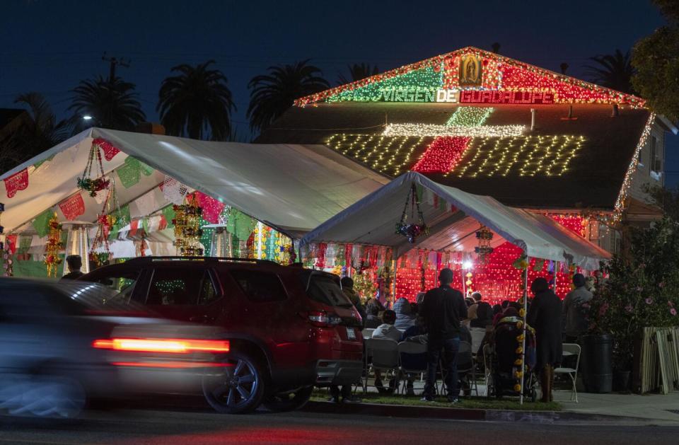 A home adorned with light has become a popular shrine in honor of the Virgen de Guadalupe