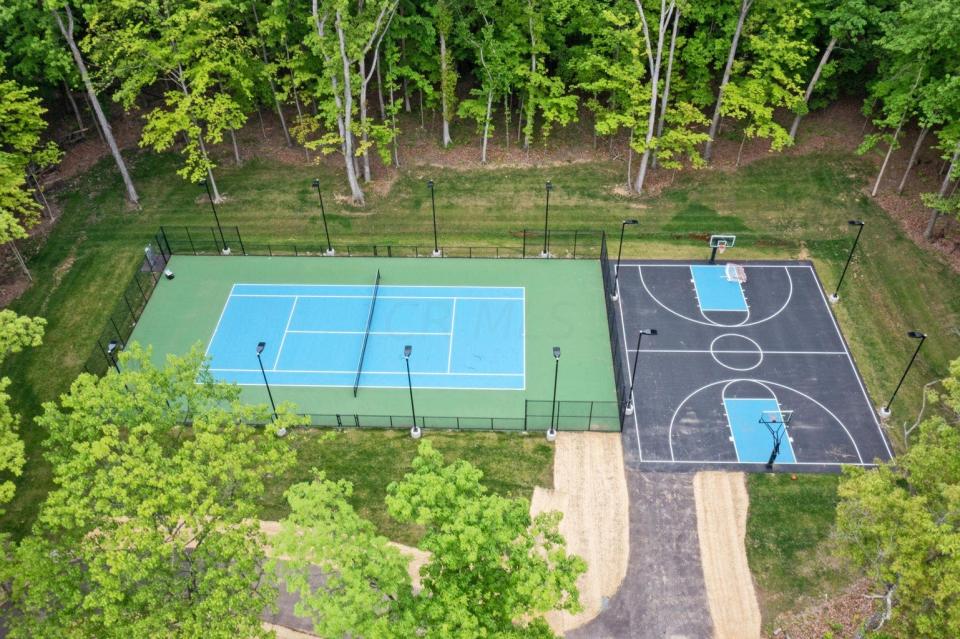 A Hoover Reservoir home listed for $4.2 million includes lighted tennis and basketball courts.