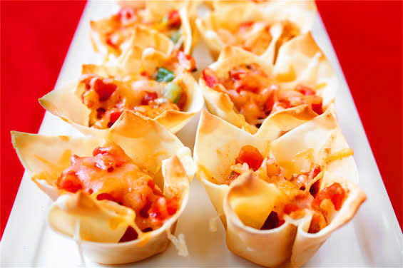 <strong>Get the <a href="http://www.gimmesomeoven.com/chipotle-chicken-cups/">Chipotle Chicken Cups recipe from Gimme Some Oven</a></strong>  These are like individual nacho bowls!