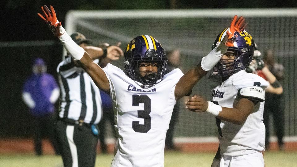 Camden's Braheem Long, center, celebrates as Camden defeated Haddonfield, 7-3, in the football game played at Haddonfield Memorial High School on Friday, October 7, 2022.  