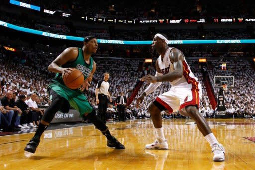 Boston Celtics' Paul Pierce (L) looks to pass the ball as Miami Heat's LeBron James defends during game one of the NBA Eastern Conference Finals on May 28. The Celtics looked a step slow most of the night after wrapping up a seven-game second-round victory over the Philadelphia 76ers on Saturday