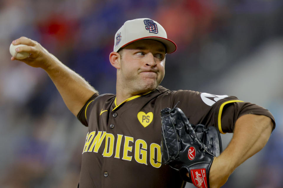 San Diego Padres starting pitcher Michael King delivers during the first inning of a baseball game against the Texas Rangers, Thursday, July 4, 2024, in Arlington, Texas. (AP Photo/Gareth Patterson)