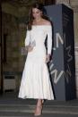 <p>The duchess wore a cream off-the-shoulder, jersey paneled dress by Barbara Casasola with a silver clutch and tan heeled sandals at the Natural History Museum in London.</p>