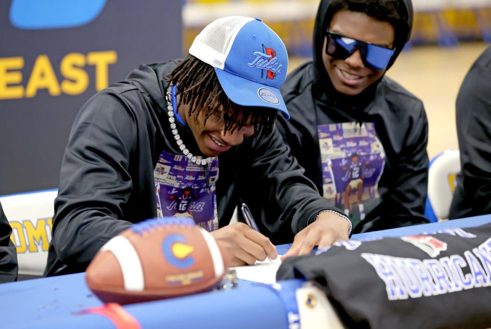 Elijah Green signs with the University of Tulsa at Classen SAS in Oklahoma City, Wednesday, Dec. 20, 2023.