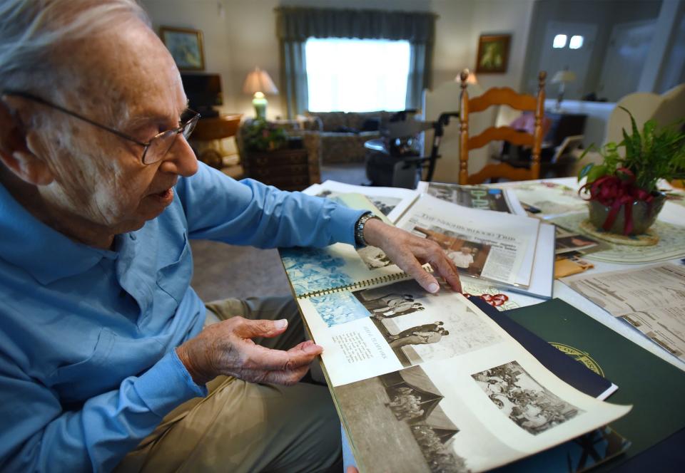 Daniel A. Passarella (age 96) of Brick, former member of the 101st Airborne Division, who went ashore on a landing craft at Normandy Beach on 6/6/44, shows historical photos during an interview at his home in Brick on 05/21/19.