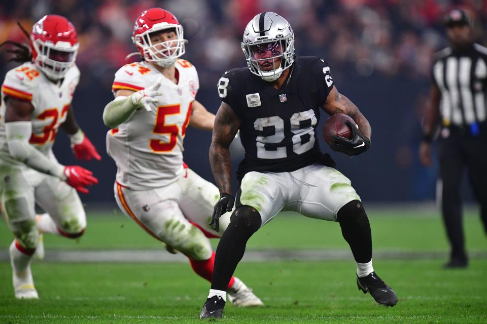 Will Josh Jacobs and the Las Vegas Raiders beat the Kansas City Chiefs on Sunday? NFL Week 12 picks, predictions and odds weigh in on the game.