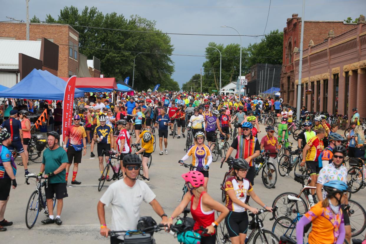 Riders roll though Schaller on the second day of RAGBRAI, Monday, July 25, 2022.