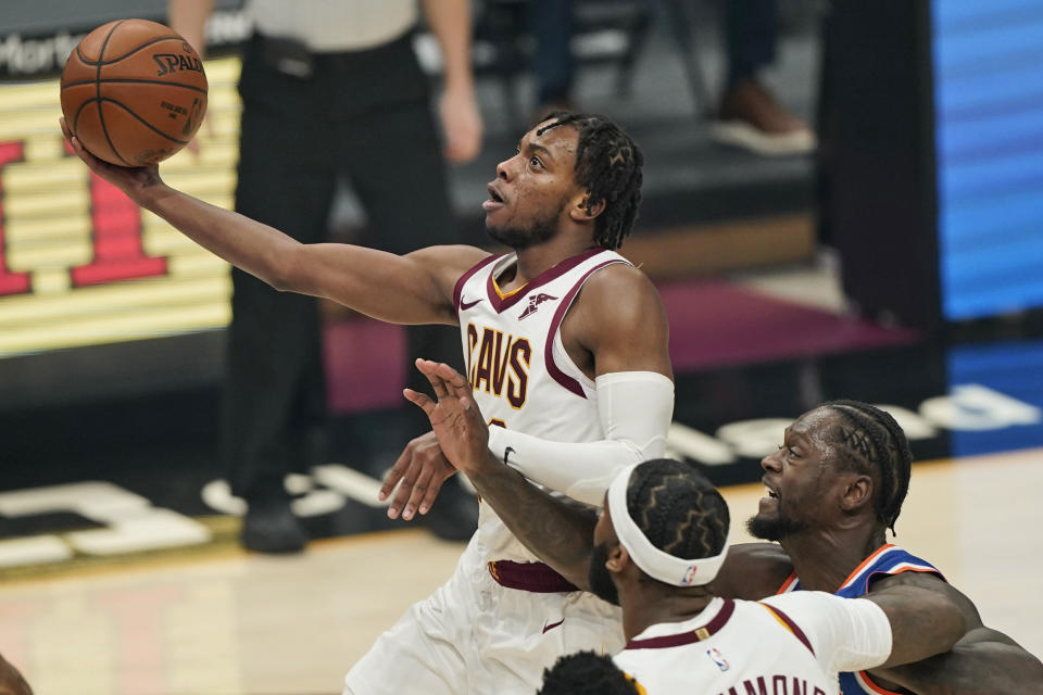 Cleveland Cavaliers' Darius Garland drives to the basket against the New York Knicks in the first half of an NBA basketball game, Tuesday, Dec. 29, 2020, in Cleveland. (AP Photo/Tony Dejak)