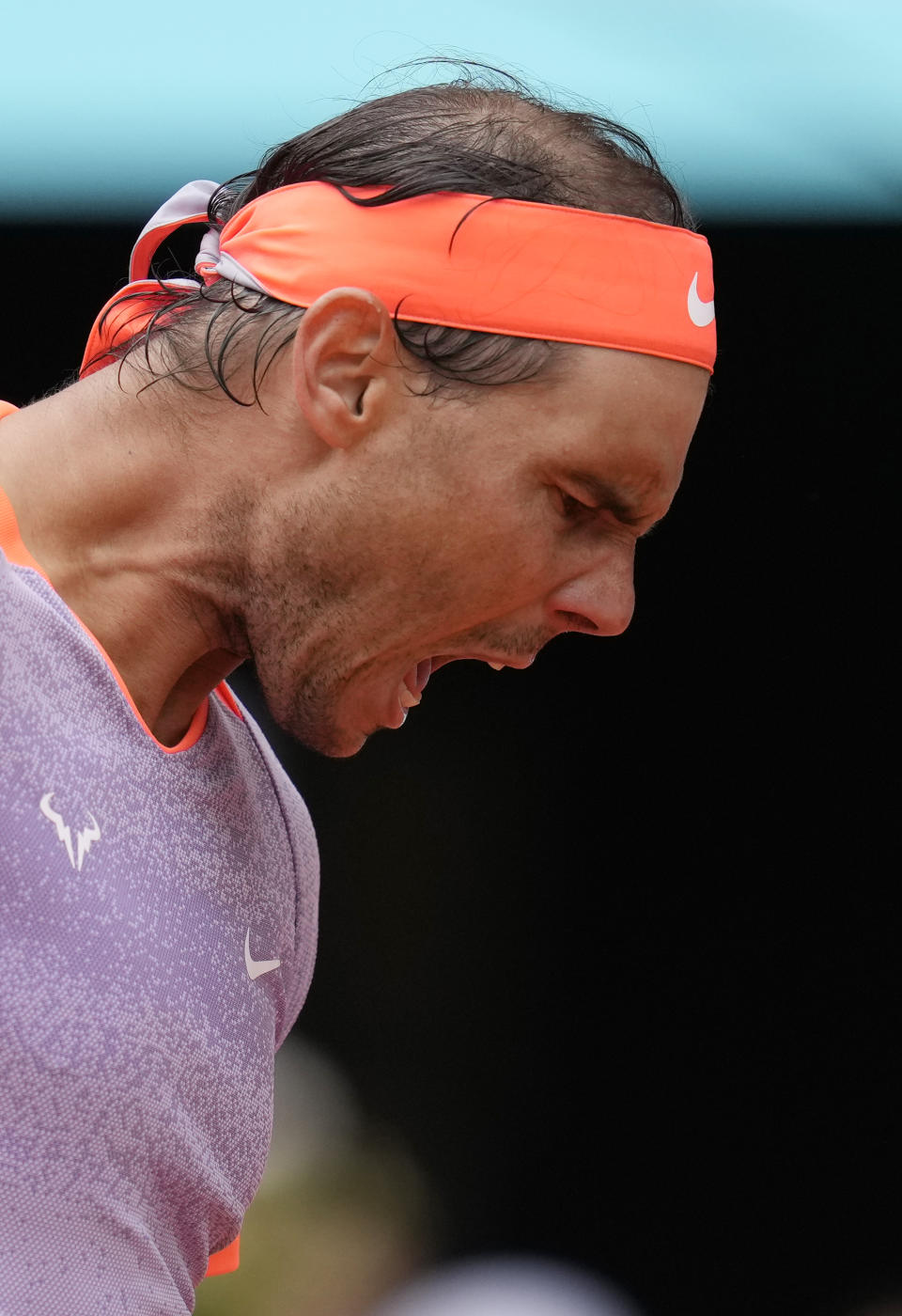 Rafael Nadal of Spain reacts against Pedro Cachin of Argentina during the Mutua Madrid Open tennis tournament in Madrid, Spain, Monday, April 29, 2024. (AP Photo/Manu Fernandez)