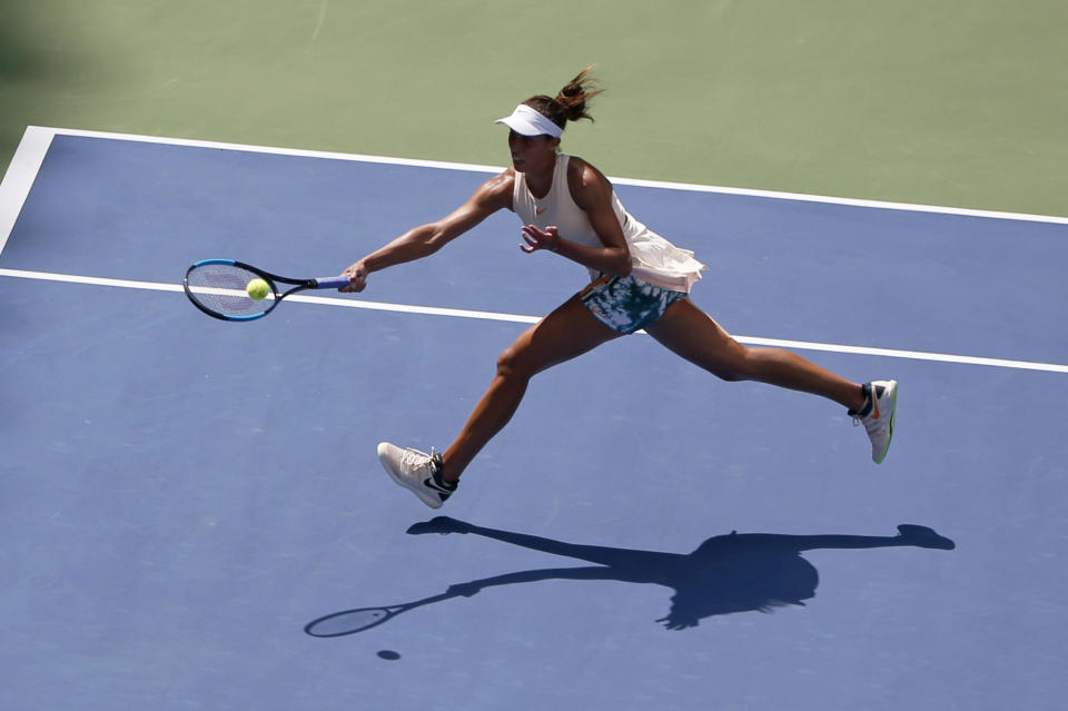 Madison Keys returns a shot to Aleksandra Krunic, of Serbia, during the third round of the U.S. Open tennis tournament, Saturday, Sept. 1, 2018, in New York. (AP Photo/Jason DeCrow)