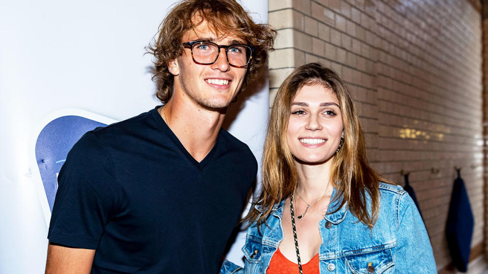 Alexander Zverev (pictured left) and his former-girlfriend Olga Sharypova (pictured right) pose for a photo.