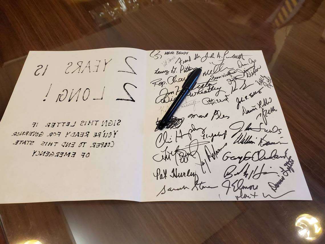 On March 10, 2022, House Republicans signed a card that read “2 Years is 2 Long! Sign this letter if you’re ready for Governor Cooper to end this state of emergency.” House Speaker Tim Moore showed the card to reporters along with a “2” balloon and cake marking the two-year anniversary of Cooper’s state of emergency.