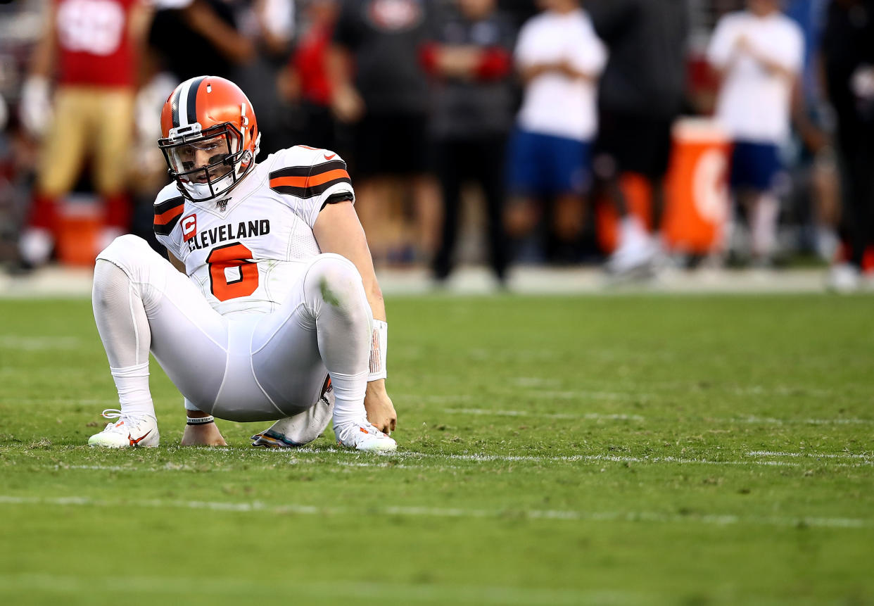 Quarterback Baker Mayfield of the Cleveland Browns gets up after being hit by the San Francisco 49ers defense. (Getty Images)