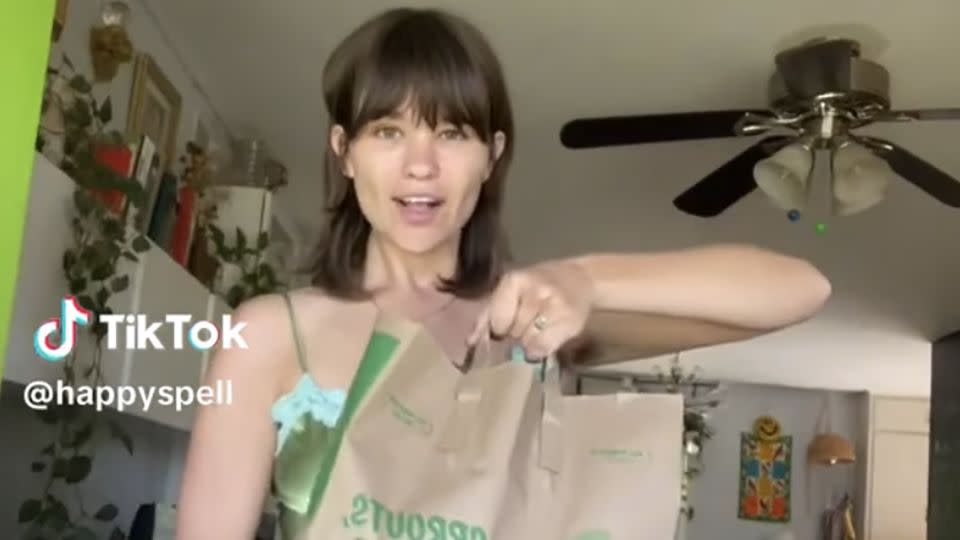 Micah Russell documents her style bundle building routine on TikTok. - Landess Hutson