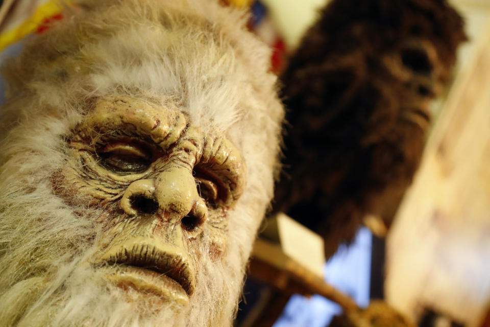 This Aug. 8, 2019, photo shows Bigfoot masks on display at Expedition: Bigfoot! The Sasquatch Museum in Cherry Log, Ga. The owner of this intriguing piece of Americana at the southern edge of the Appalachians is David Bakara, a longtime member of the Bigfoot Field Researchers Organization who served in the Navy, drove long-haul trucks and tended bar before opening the museum in early 2016 with his wife, Malinda. (AP Photo/John Bazemore)