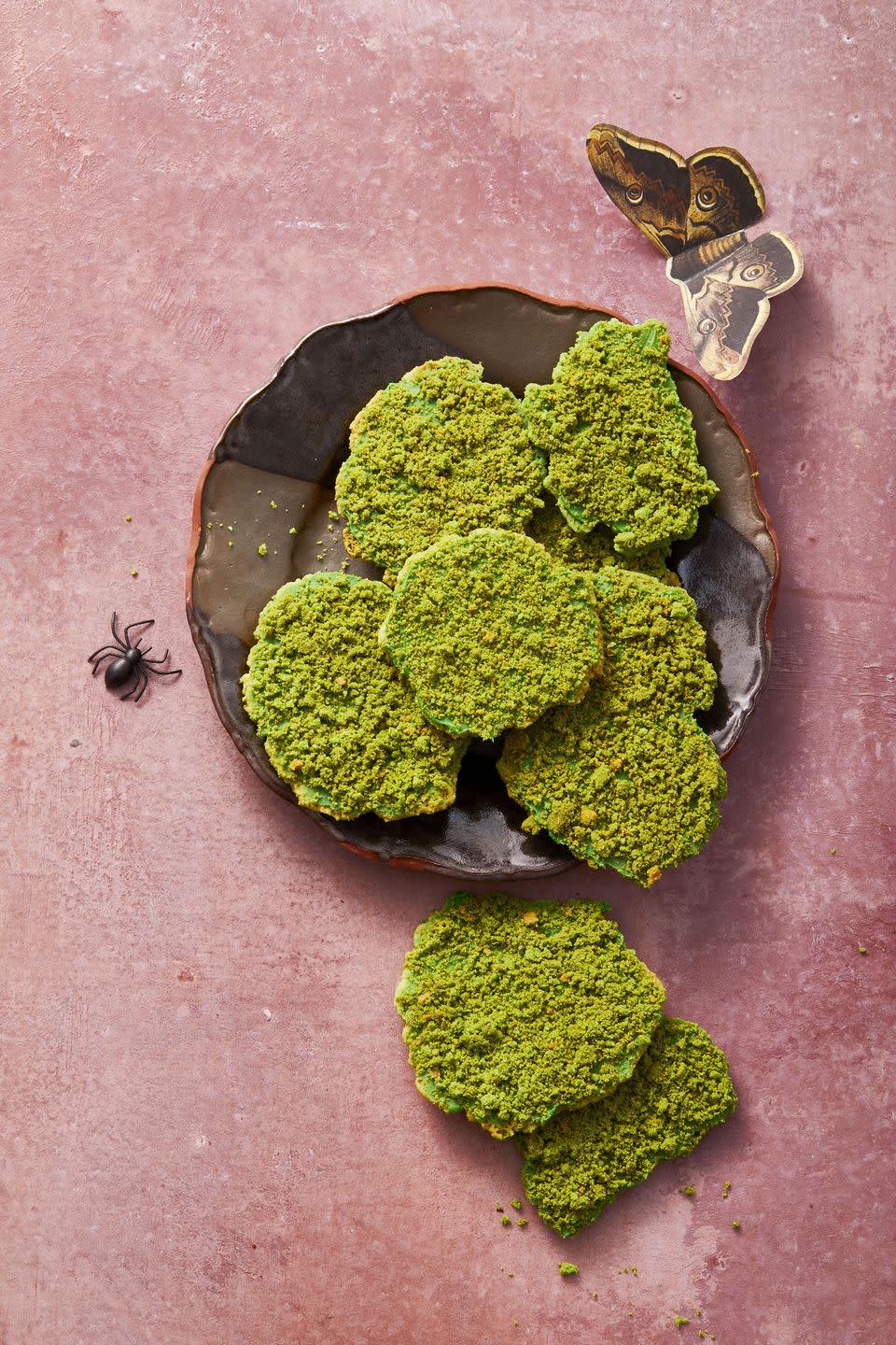 <p>Crumbled graham crackers and a little green food coloring create these unique textured treats.</p><p><a href="https://www.goodhousekeeping.com/food-recipes/a34330679/moss-cookies-recipe/" rel="nofollow noopener" target="_blank" data-ylk="slk:Get the recipe for Moss Cookies »;elm:context_link;itc:0;sec:content-canvas" class="link "><em>Get the recipe for Moss Cookies »</em></a></p>