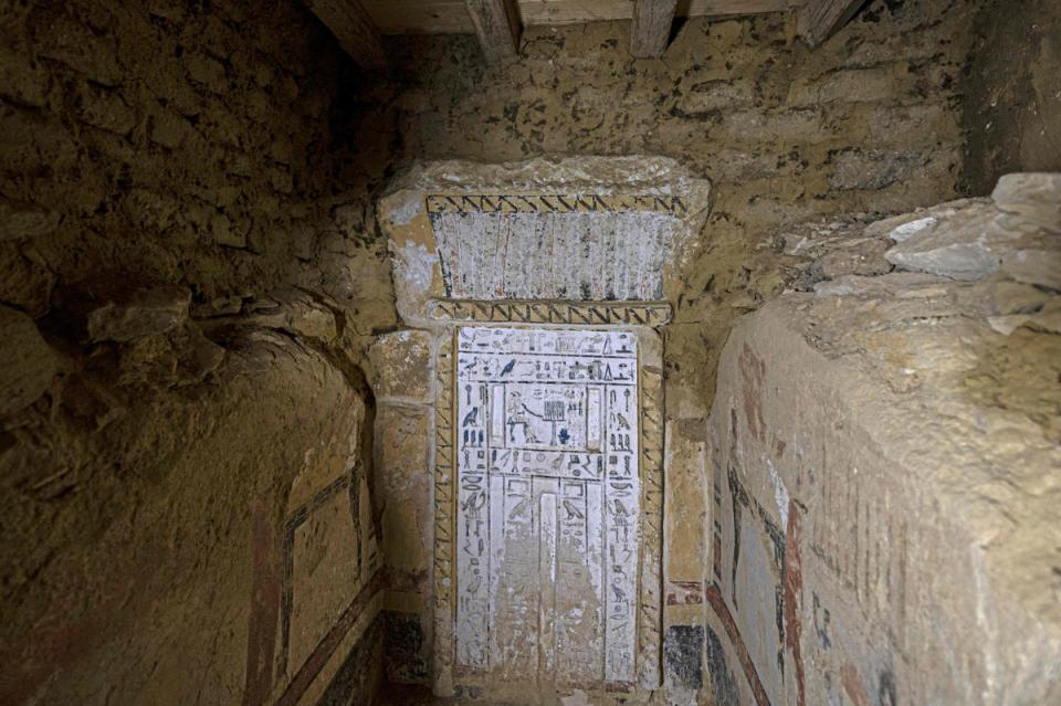 A picture shows inside the recently discovered tomb at the Saqqara archaeological site, south of Cairo (AFP via Getty Images)