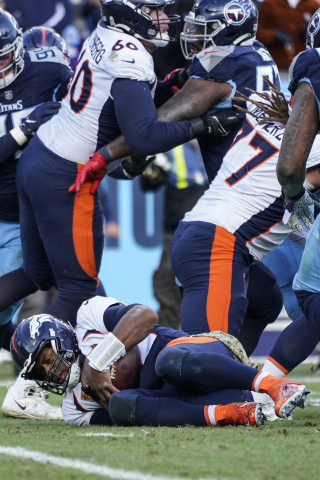 Wilson sacked 6 times, picked off late as Denver loses again