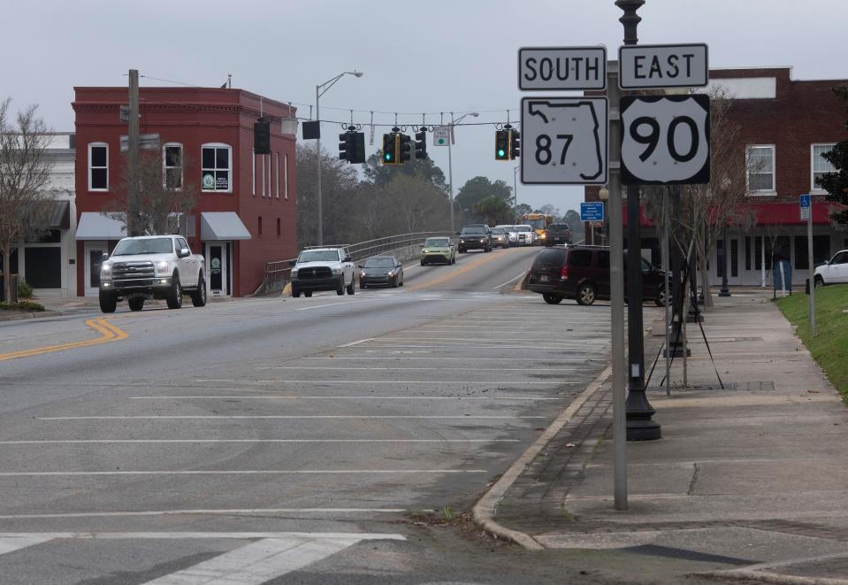 U.S. Highway 90 through downtown Milton will likely be widened to four lanes at some point in the future, but until that happens some local business owners hope to develop some of the roadside property in the planned construction zone.