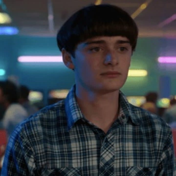 Will Byers looking sad in a plaid shirt during Season 4 of Stranger Things