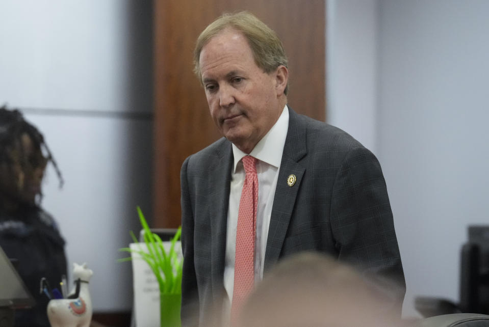 Texas Attorney General Ken Paxton appears at a pretrial hearing in his securities fraud case before state District Judge Andrea Beall, Tuesday, March 26, 2024 at Harris County Criminal Courts at Law in Houston. Prosecutors announced an agreement with Paxton that would ultimately dismiss securities fraud charges he has been facing for nearly a decade. (Yi-Chin Lee/Houston Chronicle via AP)