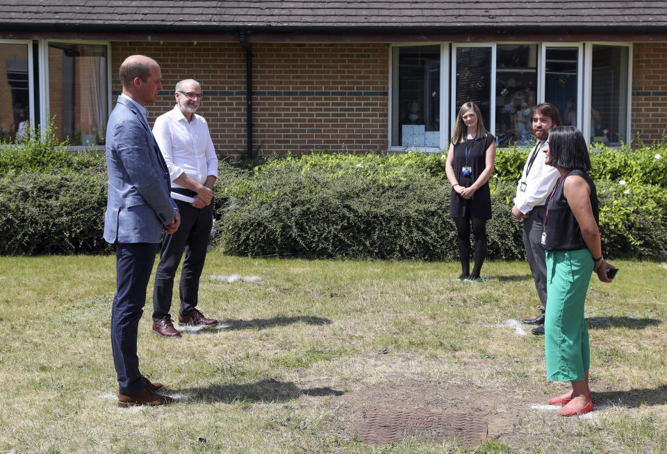 EMBARGOED: not for publication before 2200 BST Wednesday June 24, 2020. The Duke of Cambridge talks to staff at the Oxford Vaccine Group's facility at the Churchill Hospital in Oxford during a visit to learn more about their work to establish a viable vaccine against coronavirus.