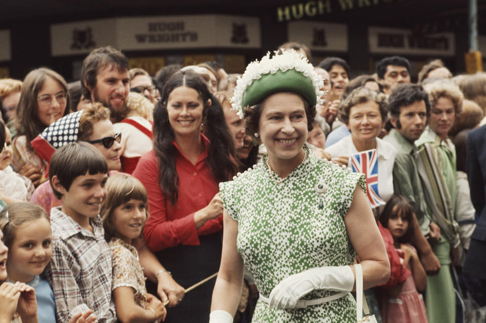 Queen Elizabeth in a green outfit in New Zealand