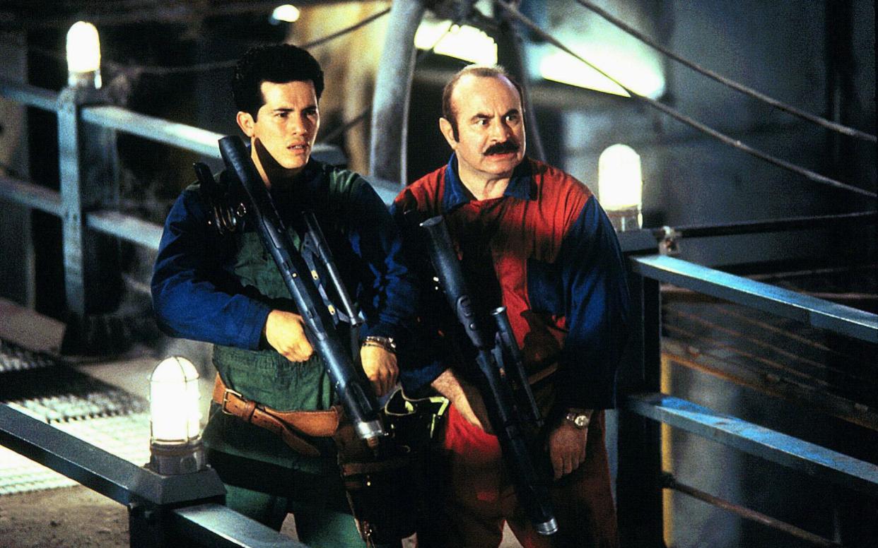 John Leguizamo and Bob Hoskins in the much-maligned 1993 Super Mario Bros adaptation - Alamy