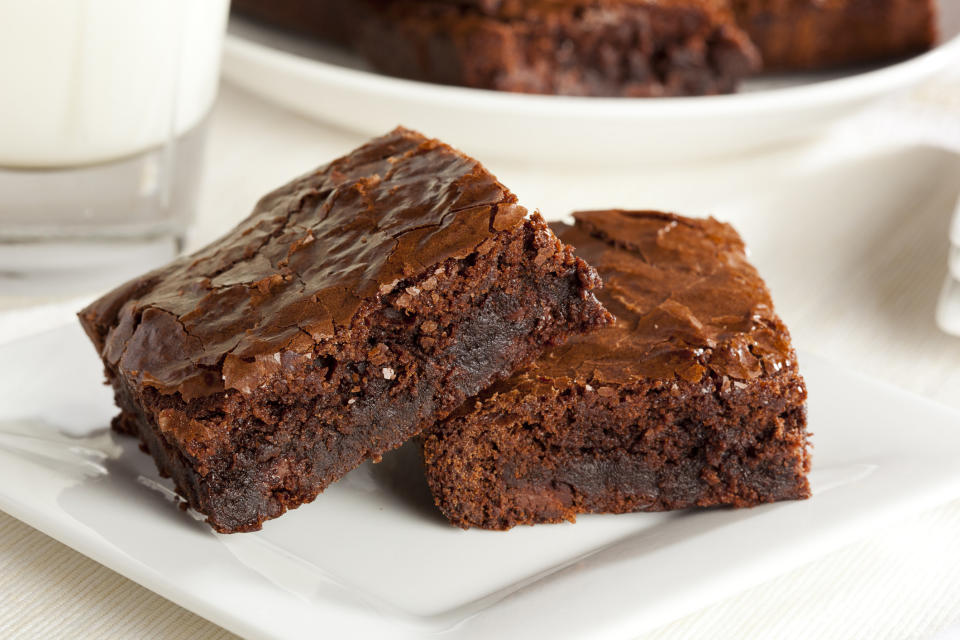 Plate of brownies on table