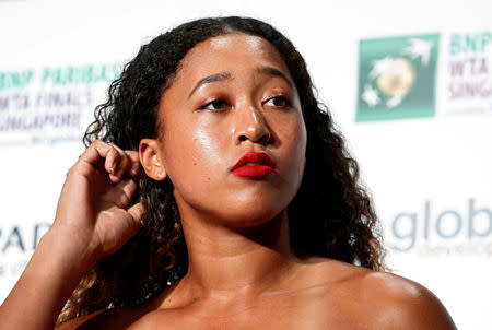 Naomi Osaka of Japan arrives for the singles draw ceremony of the WTA Tennis Finals in Singapore October 19, 2018. REUTERS/Edgar Su